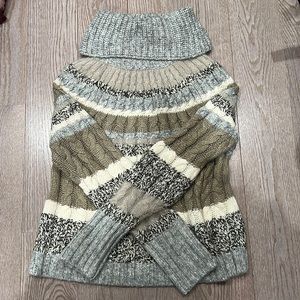 Turtle neck striped cable knit sweater
